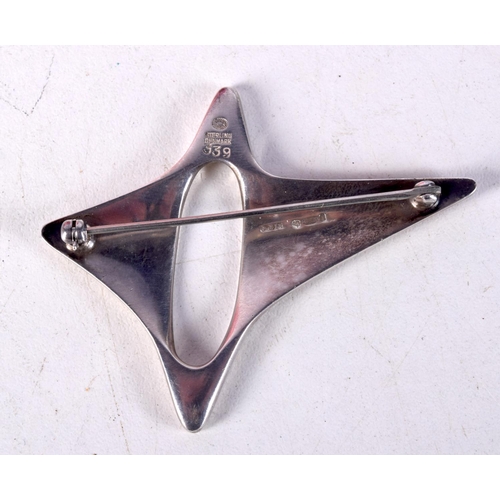 765E - GEORG JENSEN / HENNING KOPPEL SILVER STAR BROOCH.   Stamped Sterling Denmark, 5.9cm x 4.7cm, weight ... 