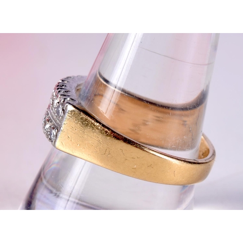 770D - AN 18CT GOLD AND DIAMOND RING.  SET WITH 18 DIAMONDS.  Size S, weight 7g