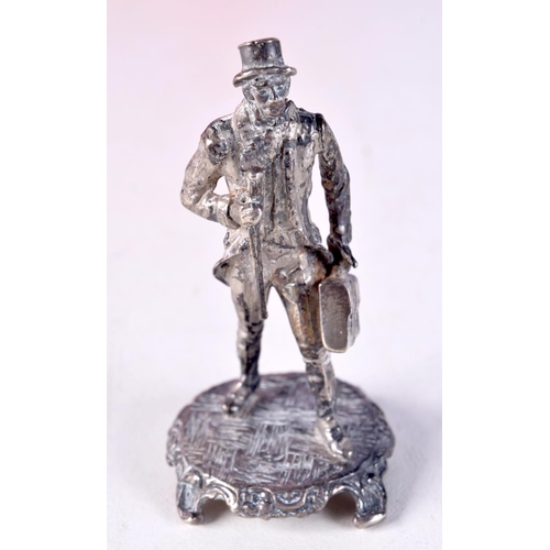 775D - A CONTEMPORARY SILVER FIGURE OF AN EDWARDIAN GENTLEMAN.  Hallmarked London 1975, 6.6cm x 3.1cm x 3.1... 