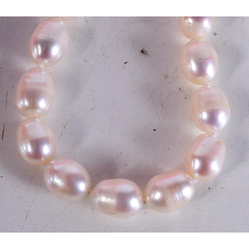 775E - A CULTURED PEARL NECKLACE TOGETHER WITH A PAIR OF 9CT GOLD BACKED PEARL EARRINGS.  Necklace 45cm lon... 