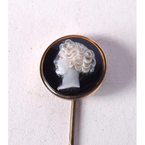 786 - A CASED CAMEO STICK PIN.  7.8cm x 1.7cm, weight 3.7g