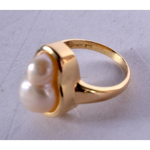 795D - A 14CT GOLD RING SET WITH A NATURAL PEARL.  Size O, Stamped 14K, weight 5.7g