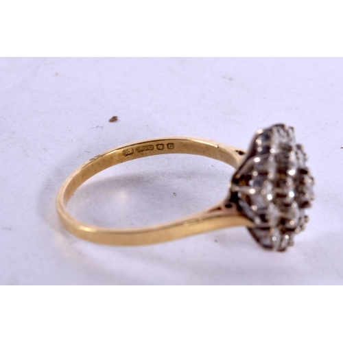 795E - AN 18CT GOLD AND DIAMOND CLUSTER RING.  Stamped 18K, Size R, weight 4.9g