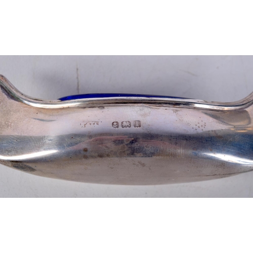 806 - A CASED PAIR OF EDWARDIAN SILVER BOAT SHAPED SALTS WITH BLUE GLASS LINERS.   Hallmarked Birmingham 1... 