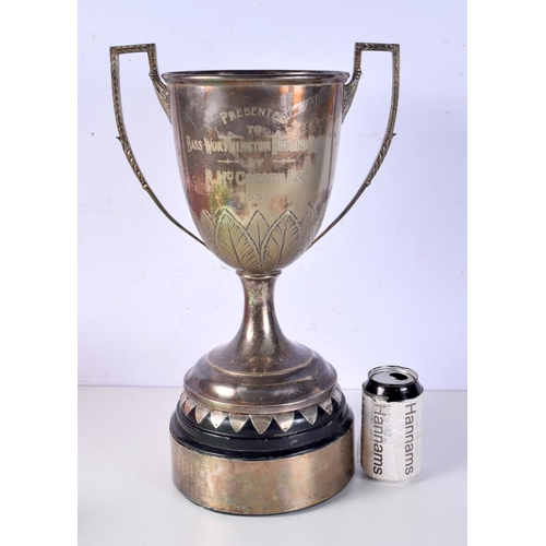 810 - A LARGE EPNS TWIN HANDLED TROPHY WITH ASSOCIATED BASE.  Trophy 35cm high