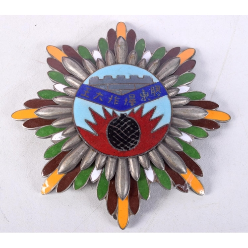 826 - TWO ORIENTAL ENAMEL BADGES.  9.2cm diameter