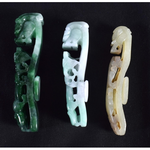 1501 - A GROUP OF SEVEN 19TH/20TH CENTURY CHINESE CARVED JADE BELT HOOKS in various forms and sizes. Larges... 