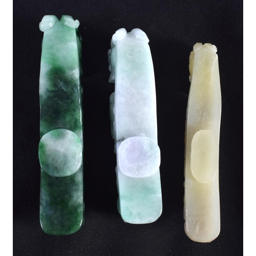 1501 - A GROUP OF SEVEN 19TH/20TH CENTURY CHINESE CARVED JADE BELT HOOKS in various forms and sizes. Larges... 