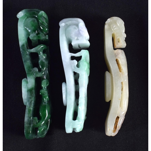 1501 - A GROUP OF SEVEN 19TH/20TH CENTURY CHINESE CARVED JADE BELT HOOKS in various forms and sizes. Larges... 