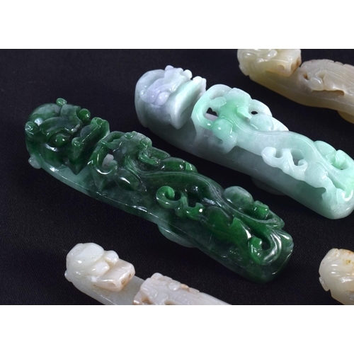 1501 - A GROUP OF SEVEN 19TH/20TH CENTURY CHINESE CARVED JADE BELT HOOKS in various forms and sizes. Larges... 