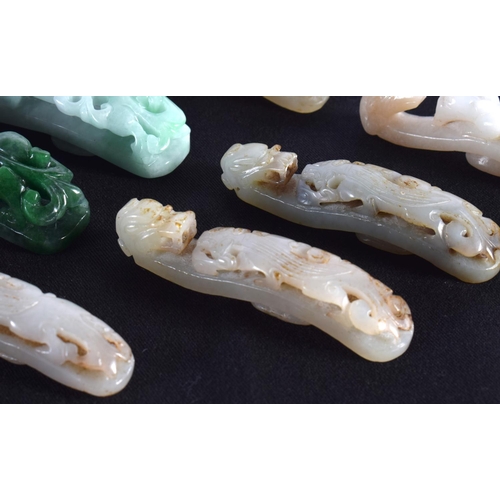 1501 - A GROUP OF SEVEN 19TH/20TH CENTURY CHINESE CARVED JADE BELT HOOKS in various forms and sizes. Larges... 