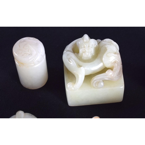 1502 - A GROUP OF EIGHT 19TH/20TH CENTURY CHINESE CARVED JADE SEALS in various forms and sizes. Largest 3.2... 