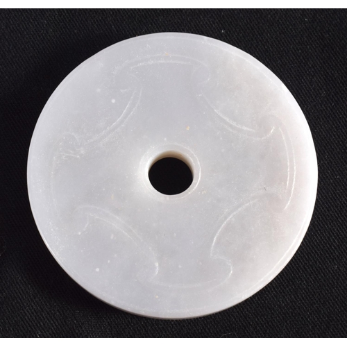 1503 - A GROUP OF NINE 19TH/20TH CENTURY CHINESE CARVED JADE BI DISCS in various forms and sizes. Largest 6... 