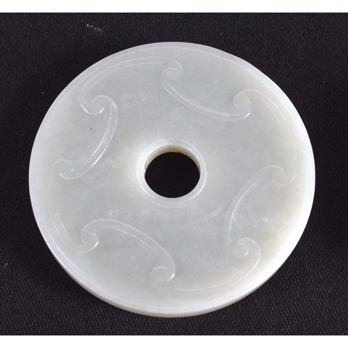 1503 - A GROUP OF NINE 19TH/20TH CENTURY CHINESE CARVED JADE BI DISCS in various forms and sizes. Largest 6... 