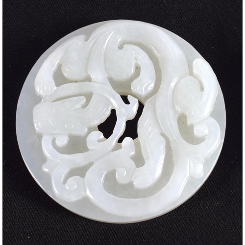 1503 - A GROUP OF NINE 19TH/20TH CENTURY CHINESE CARVED JADE BI DISCS in various forms and sizes. Largest 6... 