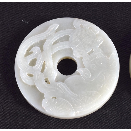 1503 - A GROUP OF NINE 19TH/20TH CENTURY CHINESE CARVED JADE BI DISCS in various forms and sizes. Largest 6... 