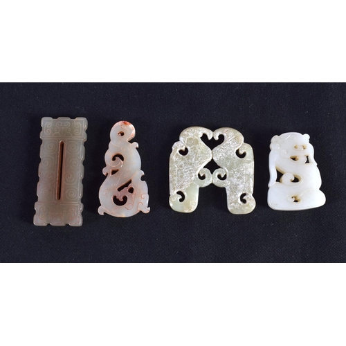 1506 - FOUR 19TH/20TH CENTURY CHINESE CARVED JADE PLAQUES in various forms and sizes. Largest 5 cm x 5 cm. ... 