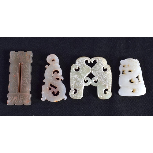 1506 - FOUR 19TH/20TH CENTURY CHINESE CARVED JADE PLAQUES in various forms and sizes. Largest 5 cm x 5 cm. ... 