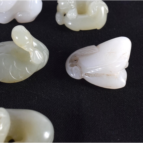 1507 - A RARE SET OF SEVEN MINIATURE 19TH/20TH CENTURY CHINESE CARVED JADE FIGURES in various forms and siz... 