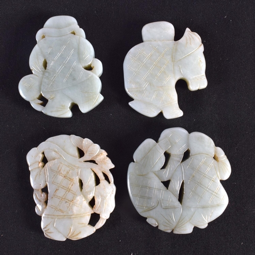 1508 - A SET OF FOUR 19TH/20TH CENTURY CHINESE CARVED JADE PLAQUES modelled as boys, including one on a hob... 