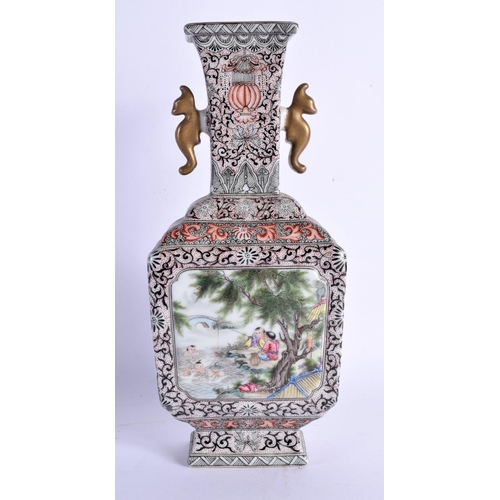 1539 - A CHINESE REPUBLICAN PERIOD FAMILLE ROSE TWIN HANDLED VASE bearing Qianlong marks to base. 20 cm x 9... 