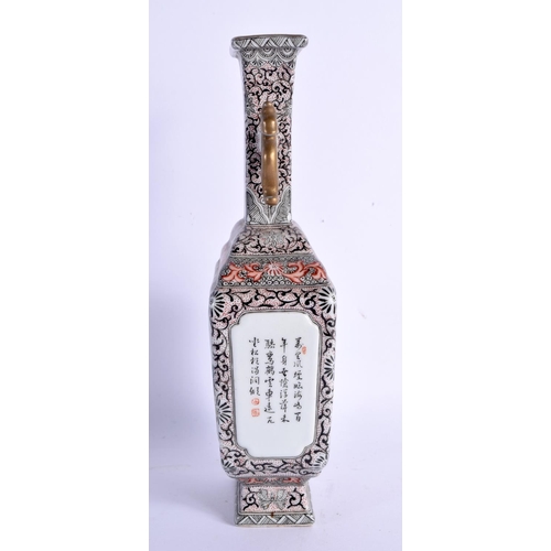 1539 - A CHINESE REPUBLICAN PERIOD FAMILLE ROSE TWIN HANDLED VASE bearing Qianlong marks to base. 20 cm x 9... 