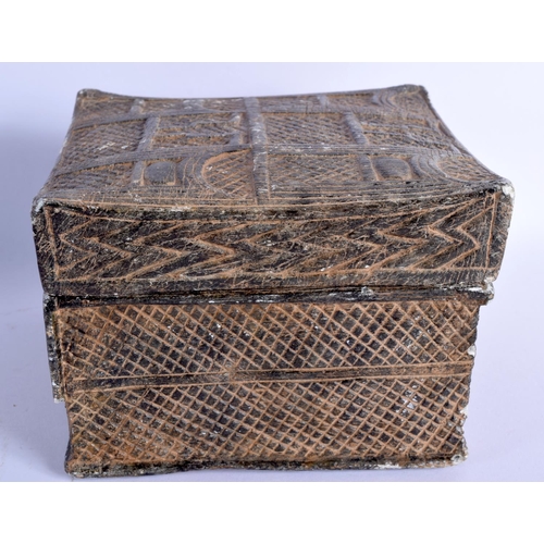 1544 - AN EARLY MIDDLE EASTERN CARVED STONE BOX AND COVER. 14 cm square.