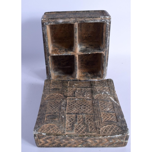 1544 - AN EARLY MIDDLE EASTERN CARVED STONE BOX AND COVER. 14 cm square.