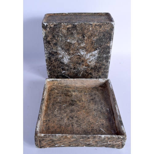 1544 - AN EARLY MIDDLE EASTERN CARVED STONE BOX AND COVER. 14 cm square.