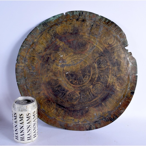 1545 - A 12TH/13TH CENTURY MIDDLE EASTERN KHOROSAN CIRCULAR TRAY decorated with motifs. 38 cm diameter.