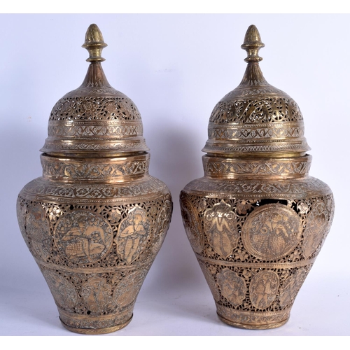 1554 - A PAIR OF EARLY 19TH CENTURY MIDDLE STERN OPEN WORK VASES decorated with figures and animals. 28 cm ... 