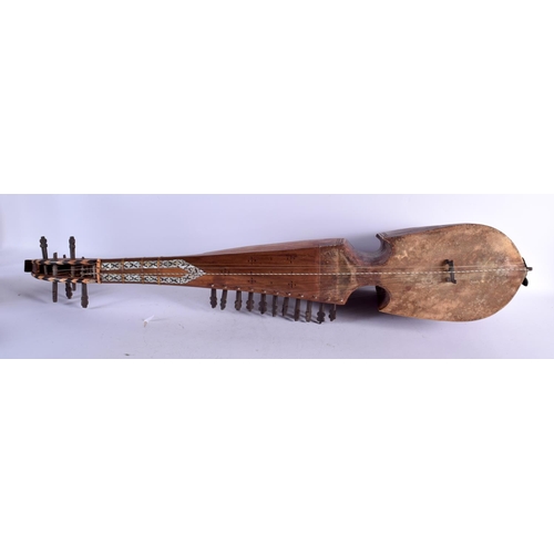 1555 - AN UNUSUAL MIDDLE EASTERN BONE AND MOTHER OF PEARL INLAID MUSICAL INSTRUMENT. 86 cm x 24 cm.