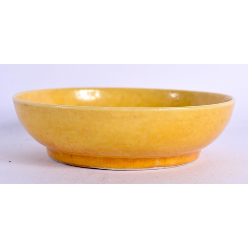 1566 - A 17TH CENTURY CHINESE IMPERIAL YELLOW GLAZED BRUSH WASHER Late Kangxi. 8.5 cm diameter.