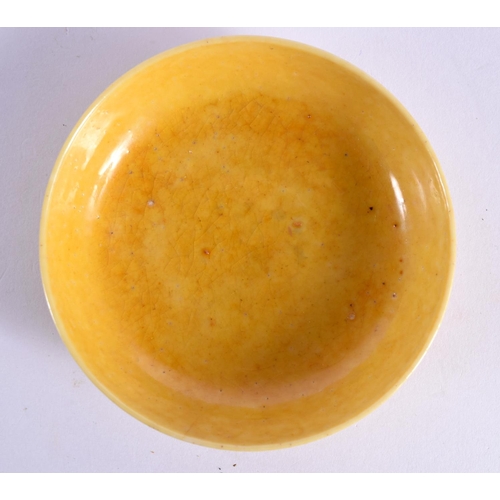 1566 - A 17TH CENTURY CHINESE IMPERIAL YELLOW GLAZED BRUSH WASHER Late Kangxi. 8.5 cm diameter.