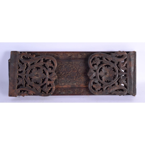 1576 - A MIDDLE EASTERN ISLAMIC CARVED WOOD SLIDING BOOK RACK. 60 cm x 15 cm extended.