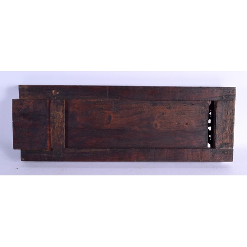 1576 - A MIDDLE EASTERN ISLAMIC CARVED WOOD SLIDING BOOK RACK. 60 cm x 15 cm extended.