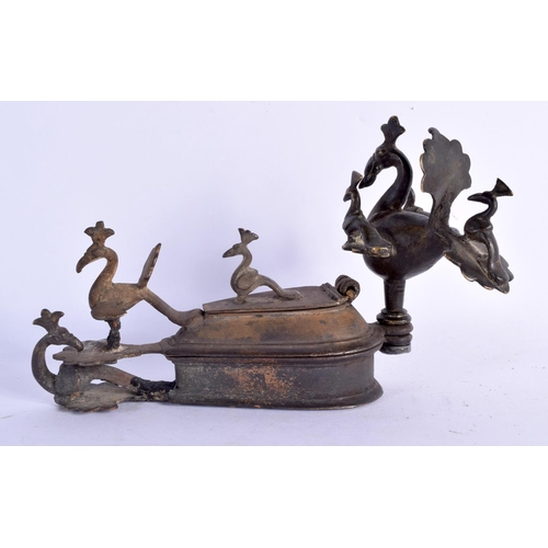 1578 - TWO 18TH CENTURY INDIAN BRONZE OIL LAMPS one formed as birds, the other as a Nandi cow. Largest 17 c... 