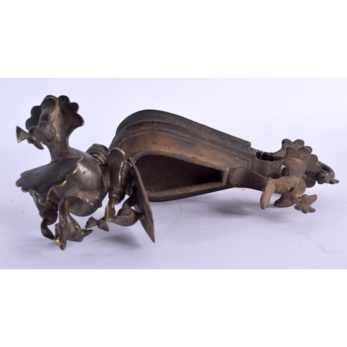 1578 - TWO 18TH CENTURY INDIAN BRONZE OIL LAMPS one formed as birds, the other as a Nandi cow. Largest 17 c... 