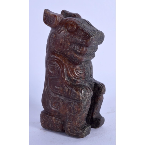 1583 - AN UNUSUAL CHINESE ARCHAIC STYLE CARVED JADE FIGURE OF A BEAST 20th Century. 7 cm high.