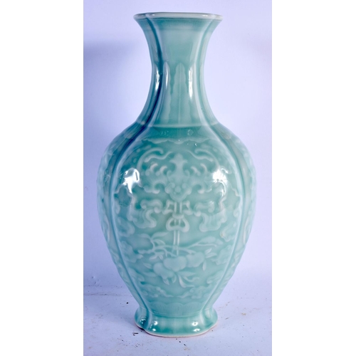 1600 - A CHINESE CELADON PORCELAIN VASE 20th Century, bearing Qianlong marks to base. 30 cm x 14 cm.