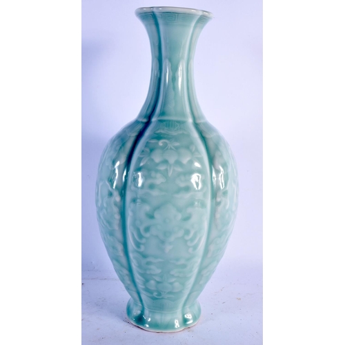 1600 - A CHINESE CELADON PORCELAIN VASE 20th Century, bearing Qianlong marks to base. 30 cm x 14 cm.