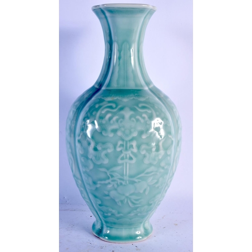 1600 - A CHINESE CELADON PORCELAIN VASE 20th Century, bearing Qianlong marks to base. 30 cm x 14 cm.