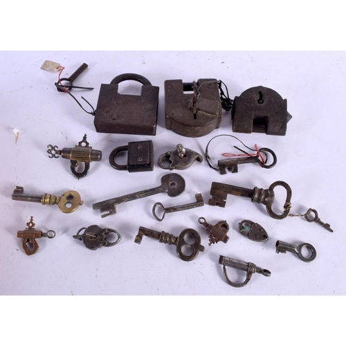 1602 - A COLLECTION OF 18TH/19TH CENTURY MIDDLE EASTERN AND INDIAN LOCKS & KEYS. Largest 9 cm x 11 cm. (qty... 