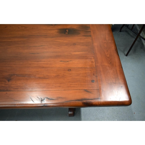 1604 - AN EARLY 20TH CENTURY CHINESE CARVED HEAVY HARDWOOD DINING TABLE with eight matching chairs, the tab... 