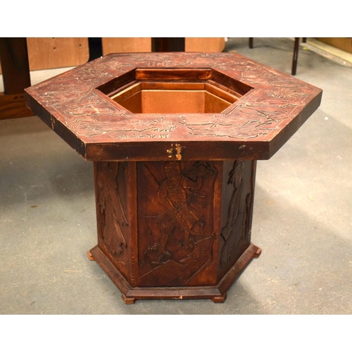 1605 - AN UNUSUAL EARLY 20TH CENTURY JAPANESE MEIJI PERIOD CARVED HARDWOOD WATER TABLE decorated with figur... 