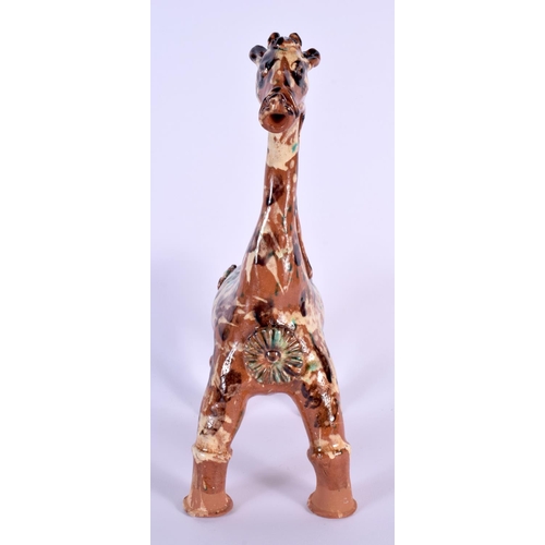 1619 - A TURKISH CANAKKALE POTTERY FIGURE OF A GIRAFFE. 32 cm x 15 cm.