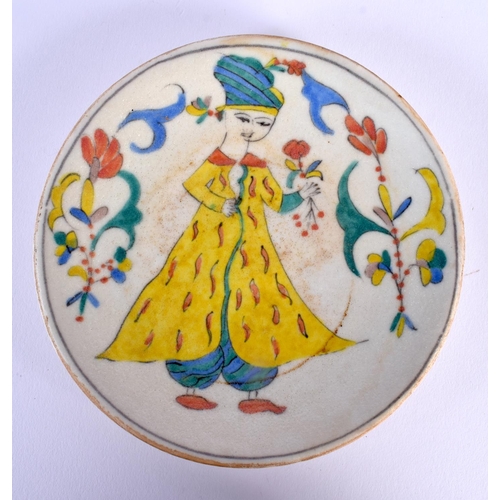 1621 - A PAIR OF TURKISH KUTAHYA POTTERY PLATES painted with figures. 14 cm diameter.