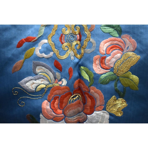 1636 - A LATE 19TH CENTURY CHINESE BLUE CHILDS SILK WORK EMBROIDERED JACKET decorated with foliage. 105 cm ... 