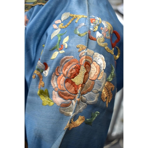 1636 - A LATE 19TH CENTURY CHINESE BLUE CHILDS SILK WORK EMBROIDERED JACKET decorated with foliage. 105 cm ... 