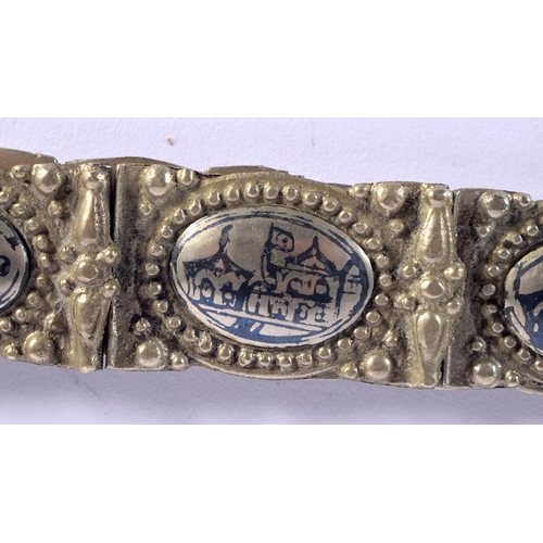 1643 - AN UNUSUAL 19TH CENTURY RUSSIAN ARMENIAN WHITE METAL NIELLO BELT decorated with scenes and foliage. ... 